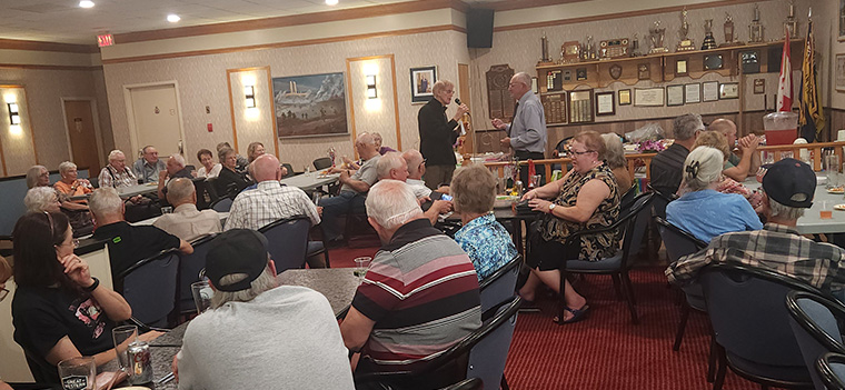 Image of the Legion Clubroom full of people at a presentation